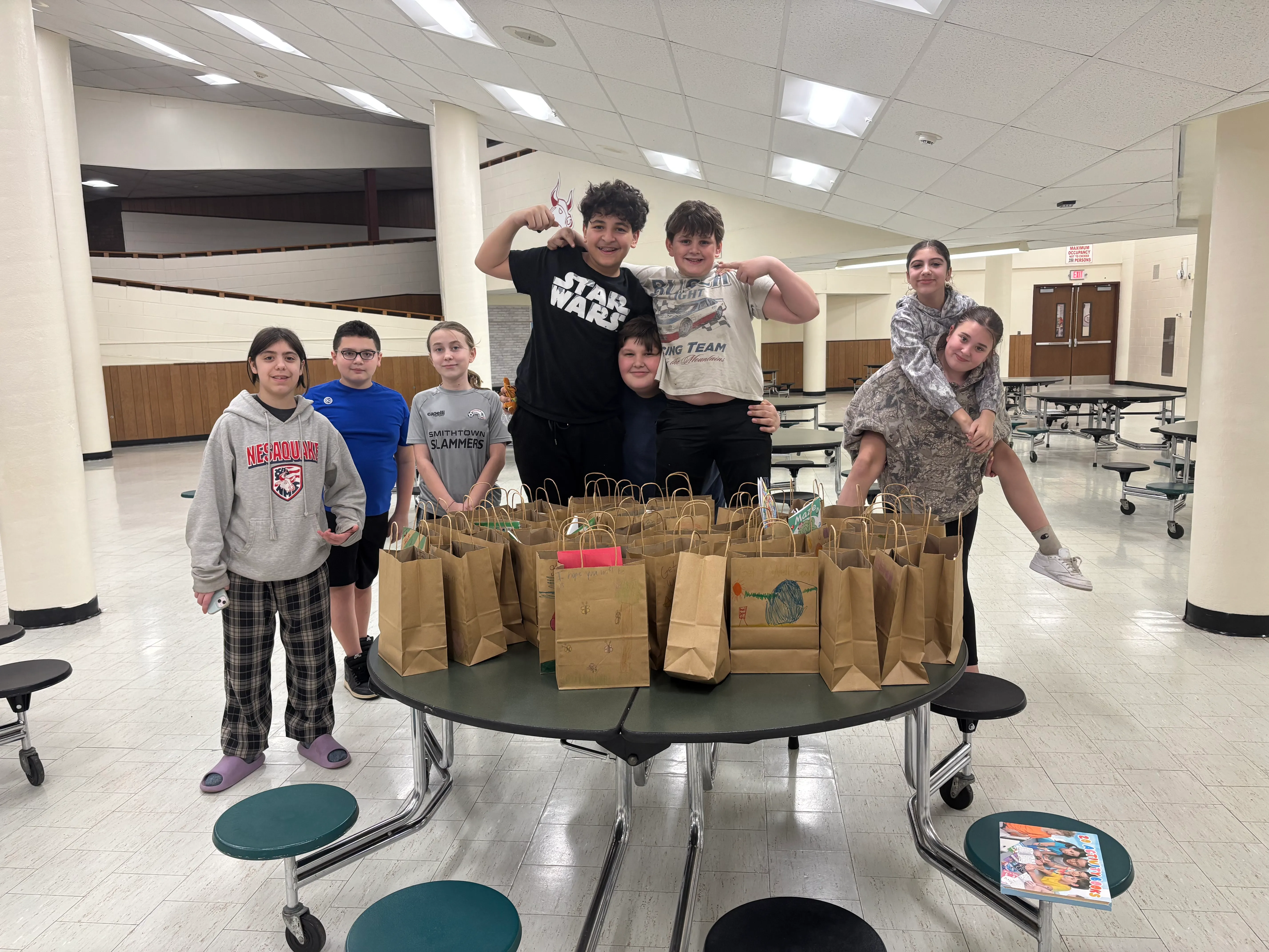 Builders Club members with care bags